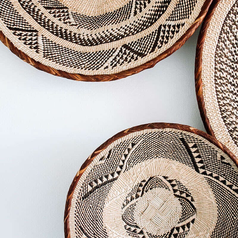 Handwoven African baskets with geometric patterns, interior detail photography Dallas, Texas