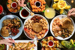 Japanese hibachi and sushi spread with lobster, shrimp, and cocktails, food photography Dallas, Texas