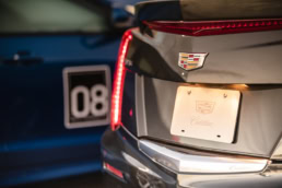 Cadillac rear badge and taillight detail at Circuit of the Americas, automotive photography Austin, Texas