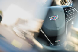 Cadillac V-Series steering wheel detail at Circuit of the Americas, automotive photography Austin, Texas