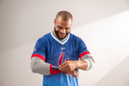 Dak Prescott wearing Lowe's jersey for DIY Home Improvement campaign, commercial photography Dallas, Texas
