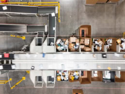 OSM Worldwide package sorting facility aerial view, industrial photography Dallas, Texas