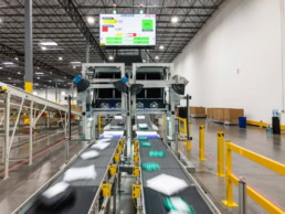 OSM Worldwide automated parcel sorting conveyor system, industrial photography Dallas, Texas
