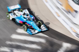 PPG-liveried Dallara IndyCar on street circuit, Indy Lights automotive photography Dallas, Texas