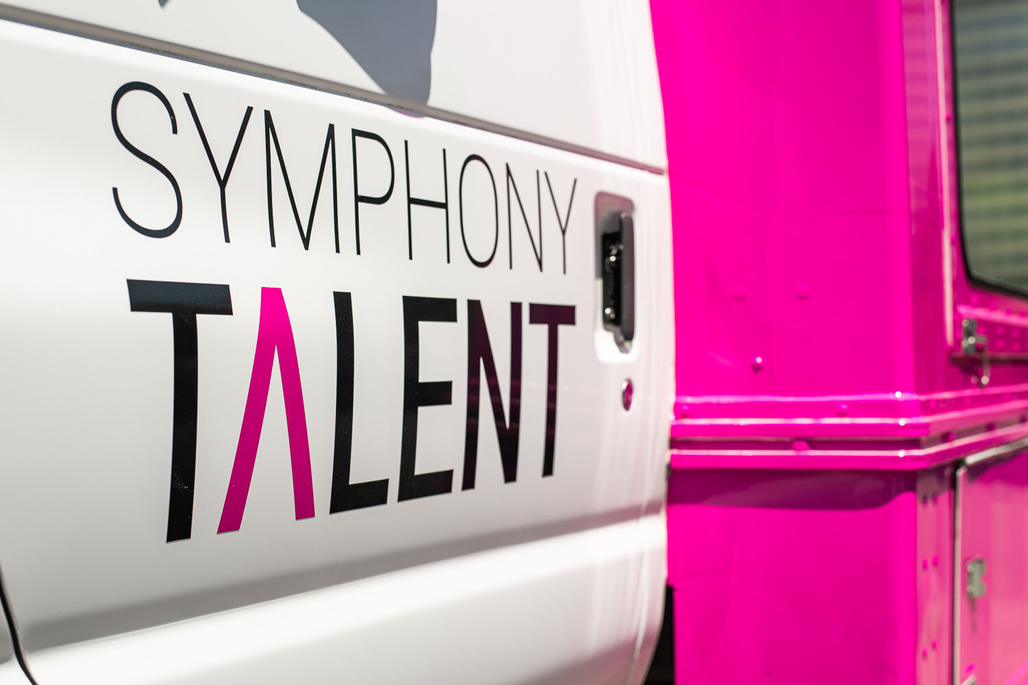 Symphony Talent branded vehicle wrap, commercial photography Dallas, Texas