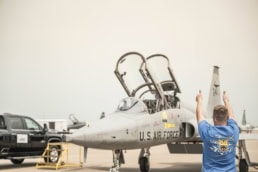 F5B Freedom Fighter jet with crew chief marshaling, AQRD aerospace photography Fort Worth, Texas