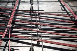 TAS Concrete rebar reinforcement grid, industrial construction photography Houston, Texas