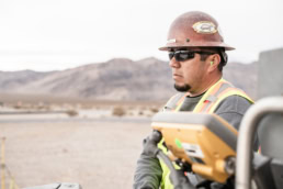 Topcon equipment operator at Spring Mountain Motorsports Ranch, industrial photography Fort Worth, Texas