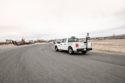 Ford F-150 survey truck on road for Topcon at Spring Mountain Motorsports Ranch, commercial photography Fort Worth, Texas