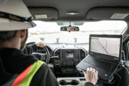 Topcon GPS mapping on Panasonic Toughbook inside Ford Super Duty, commercial photography Fort Worth, Texas