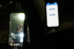 Topcon worker operating heavy equipment at night, industrial photography Fort Worth, Texas