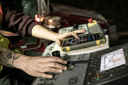 Topcon operator using tablet and control panel, industrial photography Fort Worth, Texas