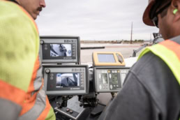 Wirtgen slipform paver control panels with Topcon display, industrial photography Fort Worth, Texas