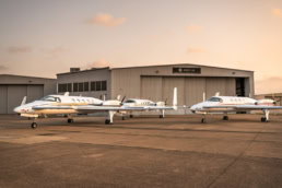 Beechcraft Starship formation on ramp at AQRD-145 hangar, aerospace photography Fort Worth, Texas