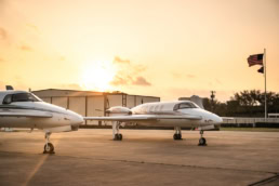 Beechcraft Starships parked on tarmac at sunset, AQRD aerospace photography Fort Worth, Texas