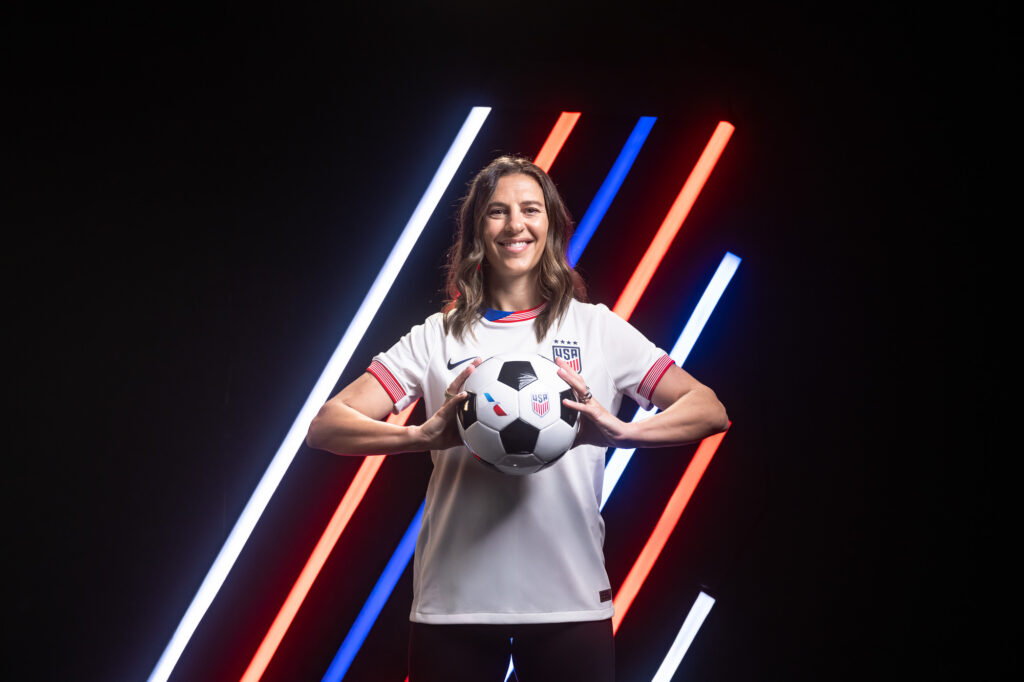 Carli Lloyd holding soccer ball, American Airlines x US Soccer commercial photography Dallas, Texas