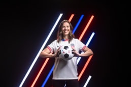 Carli Lloyd holding soccer ball, American Airlines x US Soccer commercial photography Dallas, Texas
