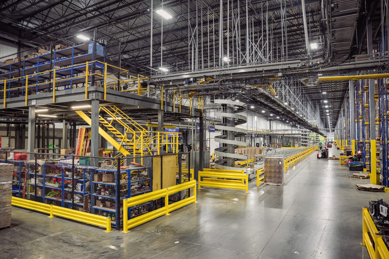 OSM Worldwide warehouse facility with mezzanine and spiral conveyor, industrial photography Dallas, Texas