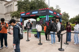 Aramco F1 and Concacaf soccer activation with fans in line, event photography Austin, Texas