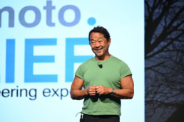 Keynote speaker on stage at corporate event, event photography Dallas, Texas