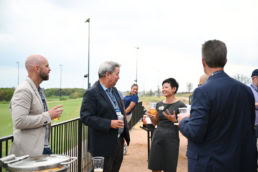 Professionals networking at outdoor corporate event, event photography Dallas, Texas