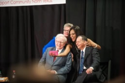 Warren Buffett taking a selfie at Support Community North Texas event, event photography Dallas, Texas