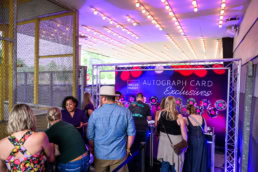 Wells Fargo Autograph Card Exclusives booth at a concert venue, event photography Dallas, Texas