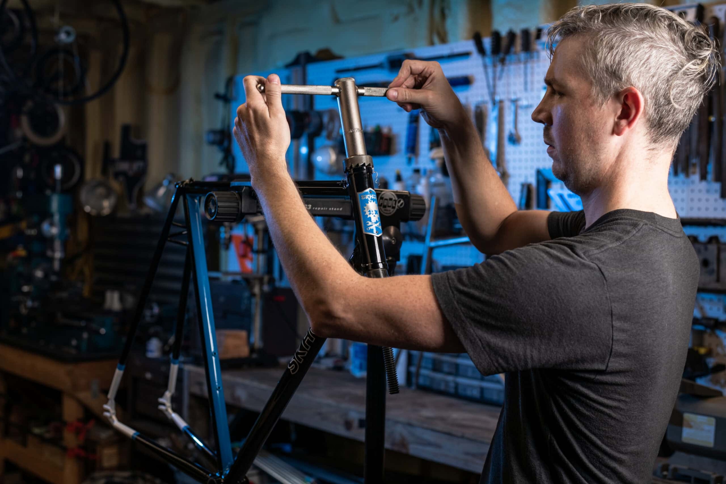 Artisan craftsman photographed in his workshop, branding photography in Richardson, Texas by David Loi Studios