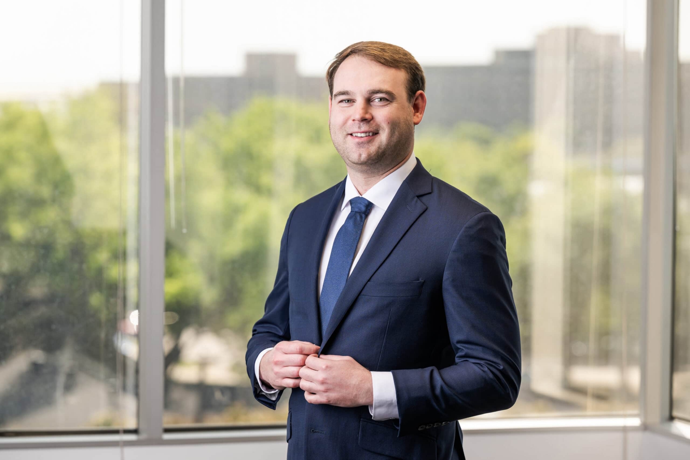 Professional business portrait of man in navy suit, corporate photography Dallas, Texas