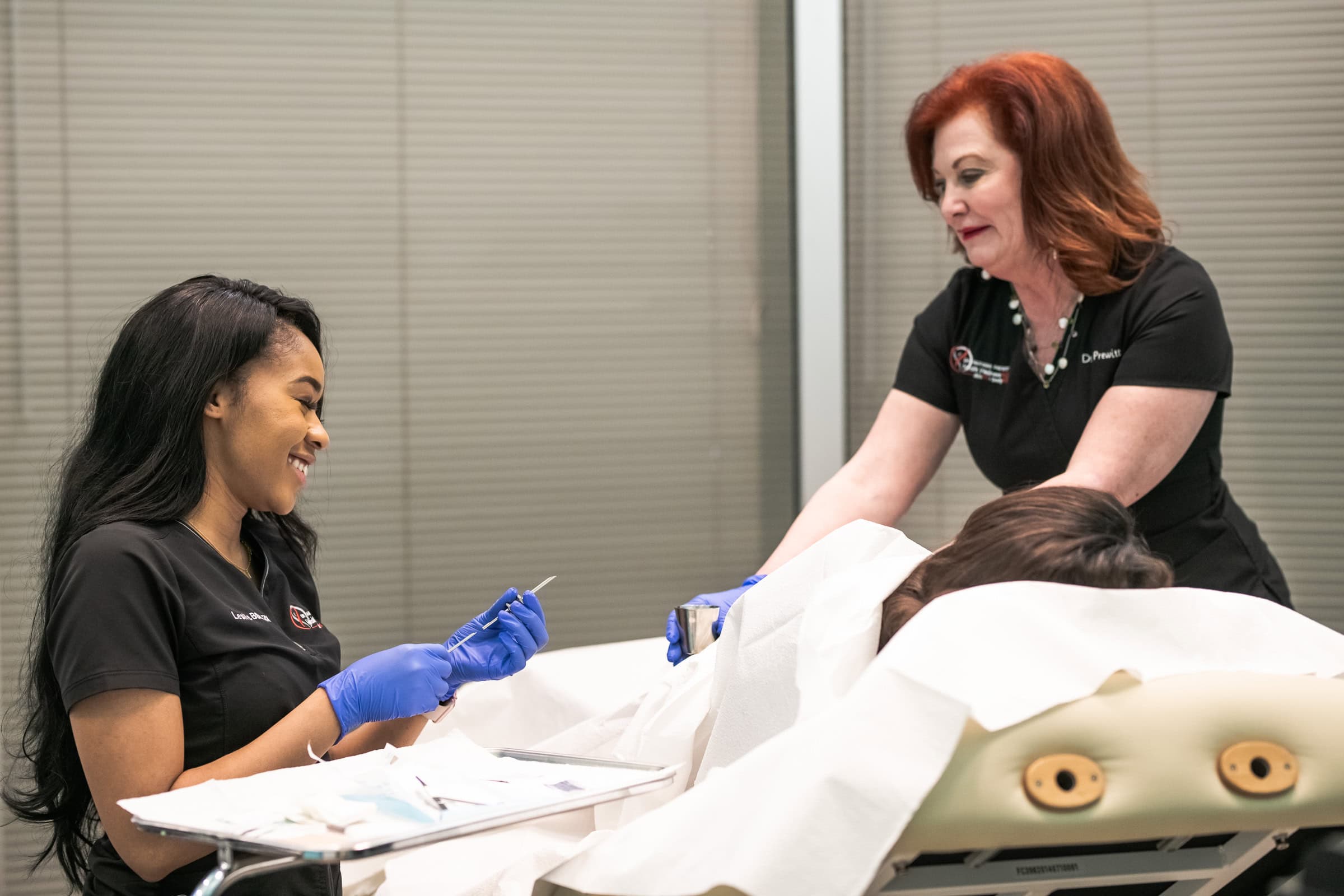 Dental hygienist working chairside with a patient, dental practice photography in Dallas, Texas by David Loi Studios