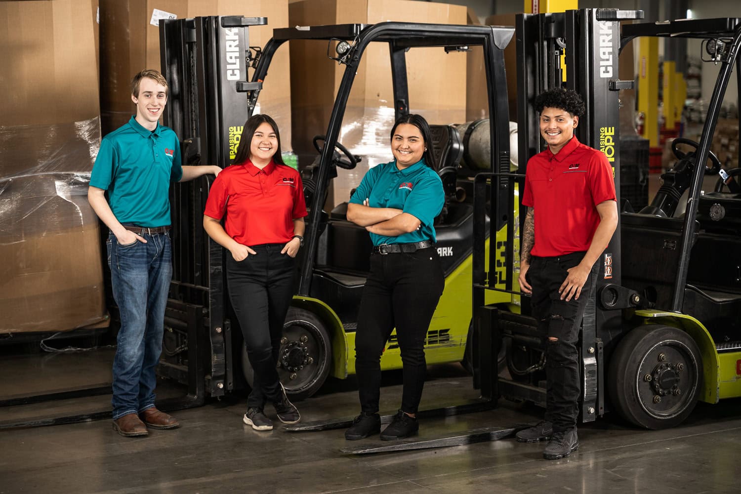 Equipment Depot team members posing with Clark forklifts, commercial photography Dallas, Texas