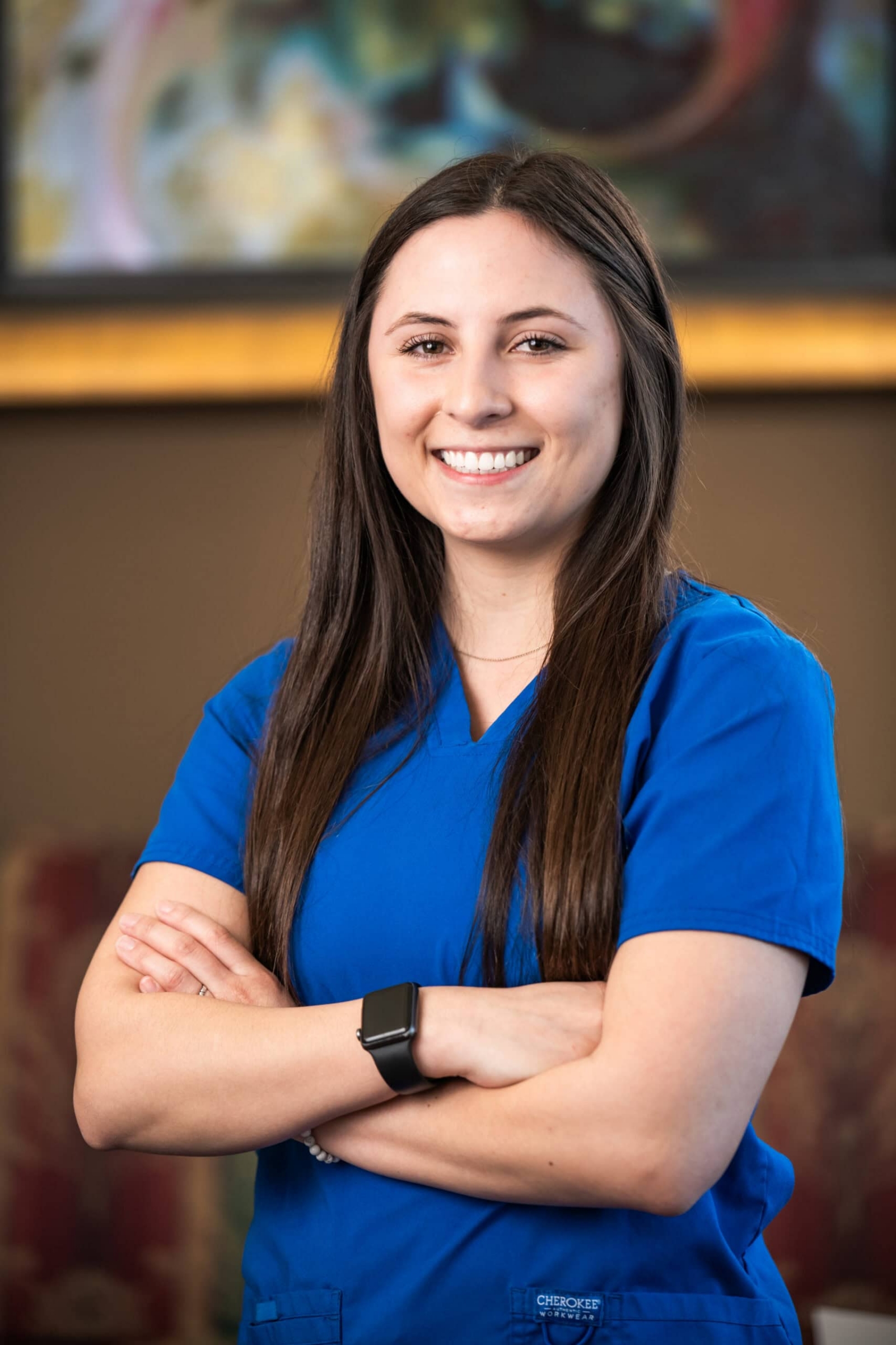 Healthcare professional in blue scrubs, corporate portrait photography Dallas, Texas