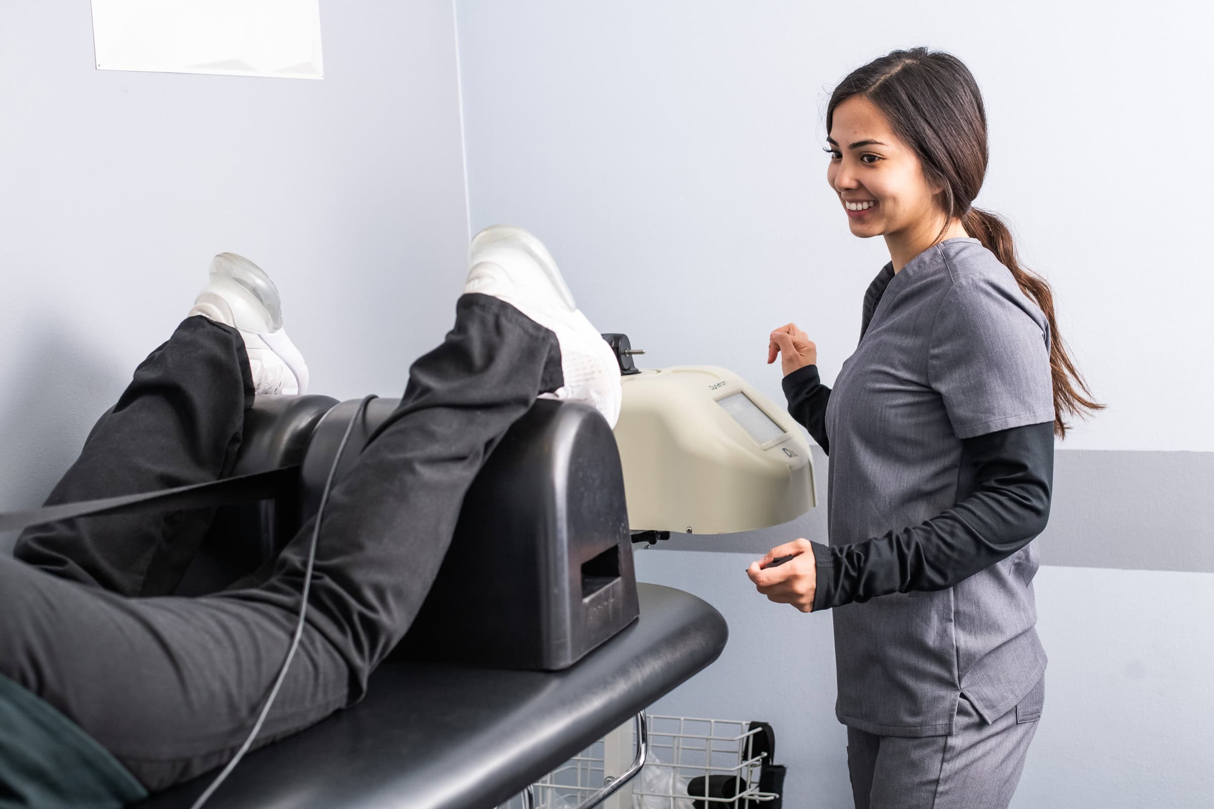 Clinician operating advanced treatment equipment on a patient, technology and equipment photography for dental practices in Dallas, Texas by David Loi Studios